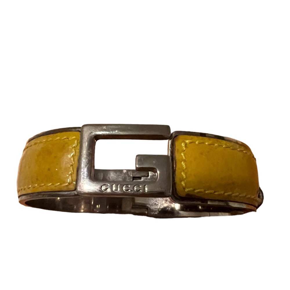 Authentic vintage gucci patent leather metal yellow bangle.from @ringabag
